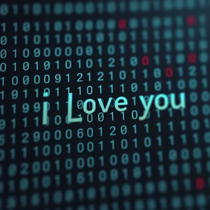 Visual representation of the phrase 'I love you' converted into a binary code sequence showing ones and zeros